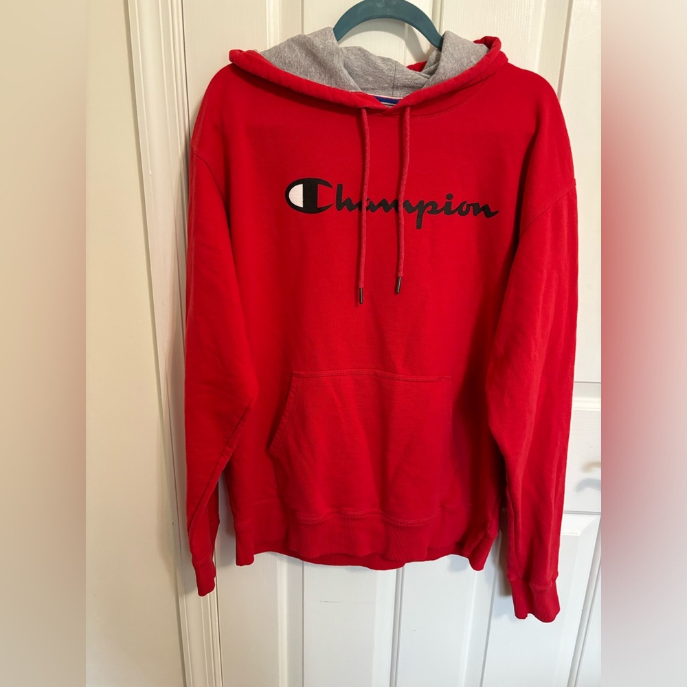 Champion men’s red drawstring hoodie. Size L. Front pocket. Grey hood interior